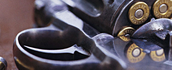 close-up view of bullets inside chambers of revolver. Used for decoration only.